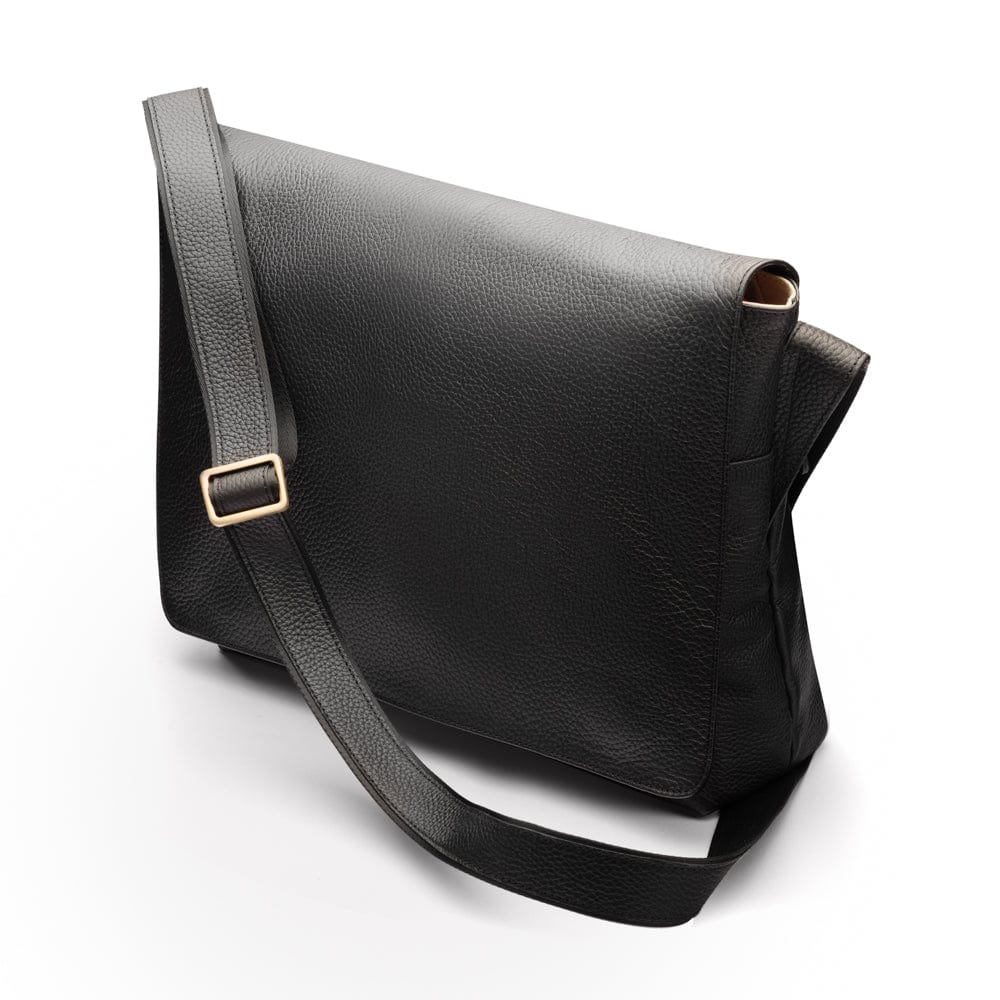 Men's large leather messenger bag, black pebble grain, side