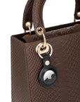 Leather airtag fob, black, on a bag