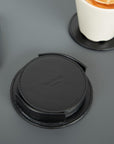 Leather drink coasters, set of 6, black, lifestyle, closeup