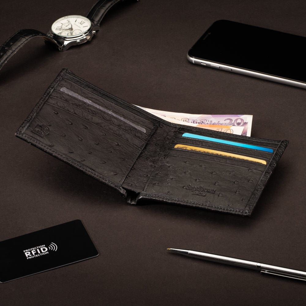 RFID wallet in ostrich leather, black, lifestyle