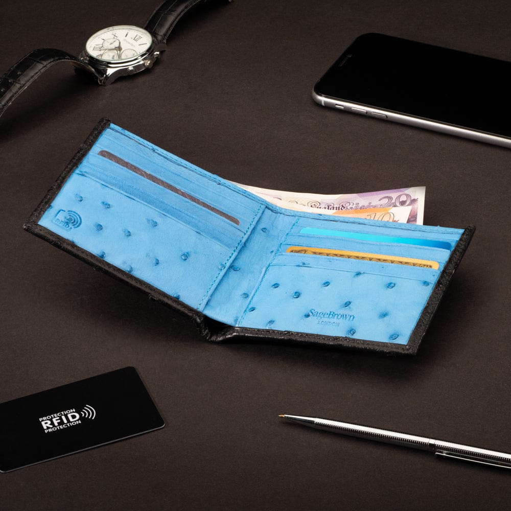 RFID wallet in ostrich leather, black with blue, lifestyle
