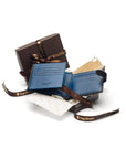 Leather wallet with tab closure, black with cobalt, packaging