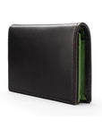Expandable leather business card holder, black with green, side