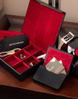 Leather business card holder with magnetic closure, black with red, lifestyle