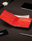 RFID wallet in ostrich leather, black with red, lifestyle