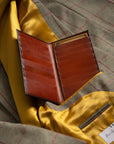 Tall leather suit wallet 16 CC, black with tan, lifestyle