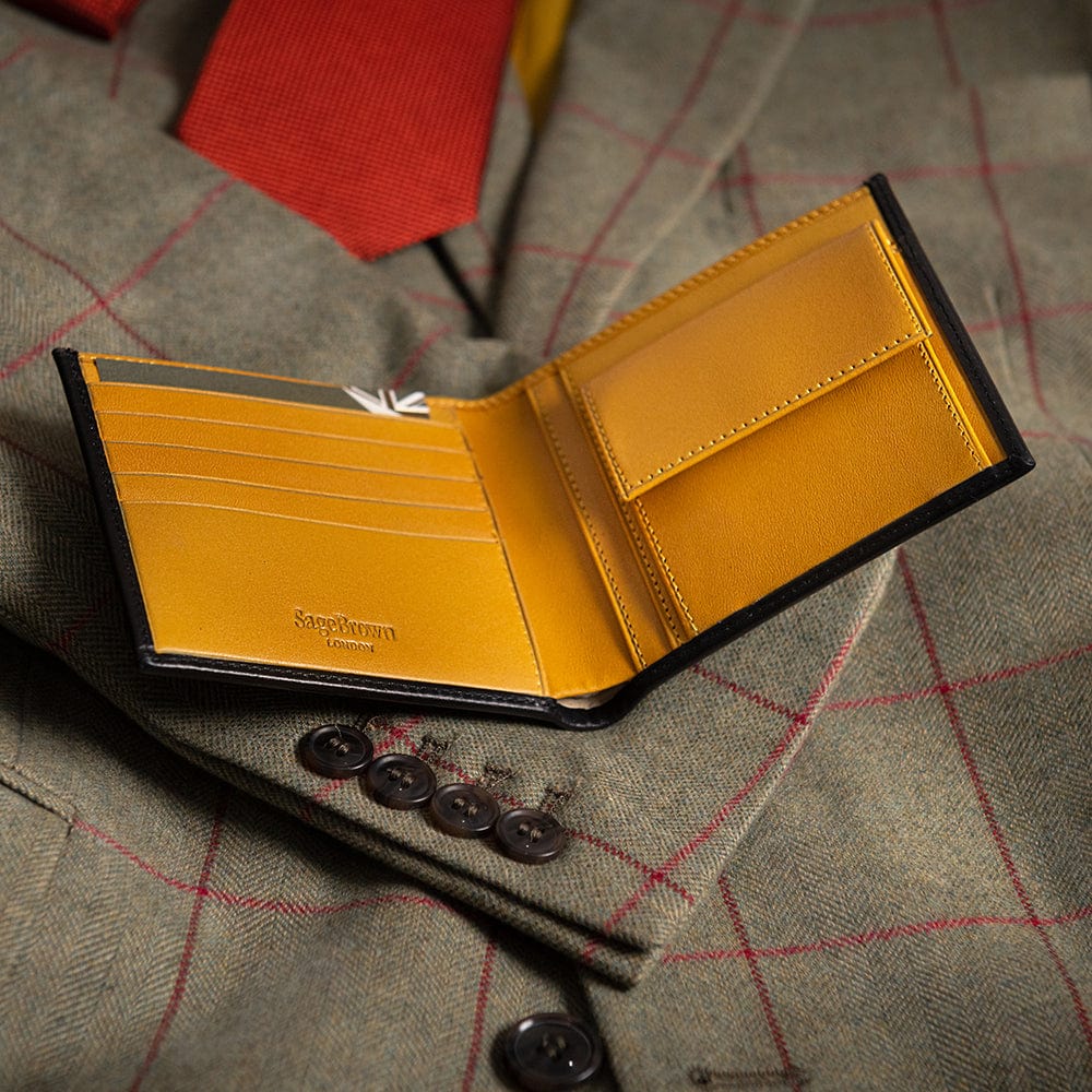 Leather wallet with coin purse, black with yellow, lifestyle