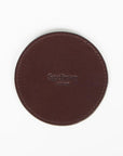 Leather drink coasters, set of 6, brown, closeup view