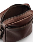 Leather messenger bag with zip, brown, open from the back view