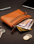 RFID Small leather zip coin pouch, tan pebble grain, lifestyle