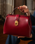 Mini leather Gladstone bag, burgundy, lifestyle