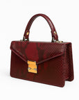 Real python Maya top handle bag, burgundy, side