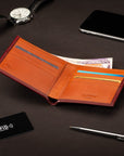 RFID wallet in bridle hide leather, burgundy with orange, lifestyle