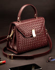 Woven leather Sabrina bag, burgundy, lifestyle