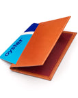 Leather travel card wallet, orange with red, front