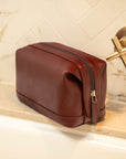 Leather wash bag, dark tan, lifestyle