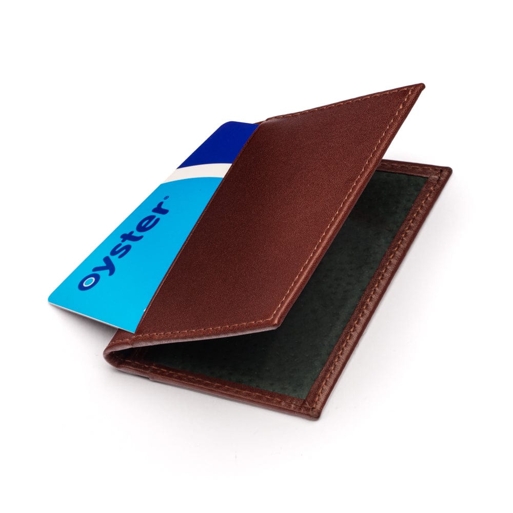 Leather travel card wallet, dark tan with green, front