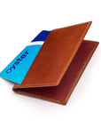 Leather travel card wallet, havana tan with red, front