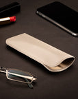 Small leather glasses case, soft ivory, lifestyle