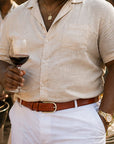 Mens extra long leather belt, tan, gold buckle, lifestyle