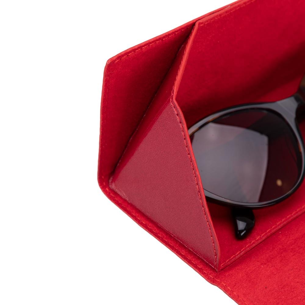 Triangular leather glasses case, burnished red, close up