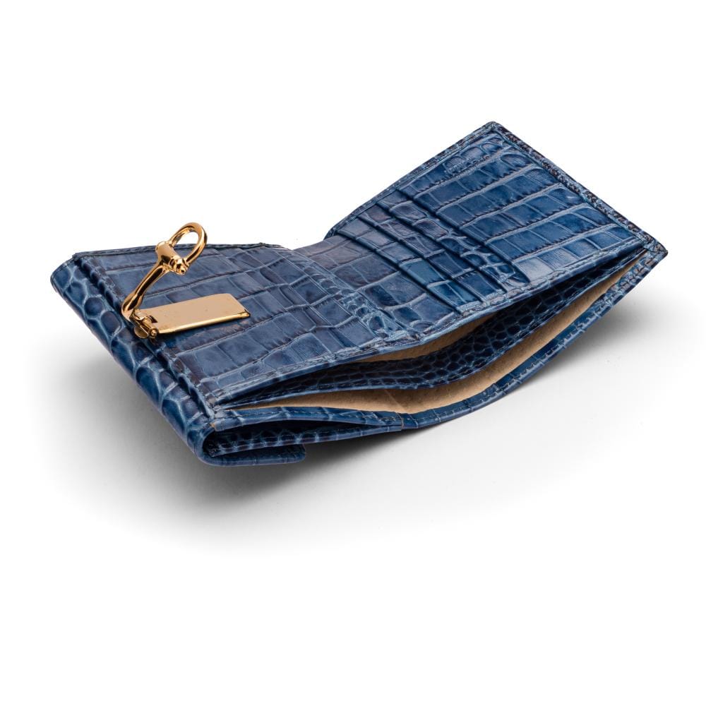 Leather purse with brass clasp, navy croc, inside