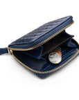 Small zip around woven leather accordion purse, navy, front