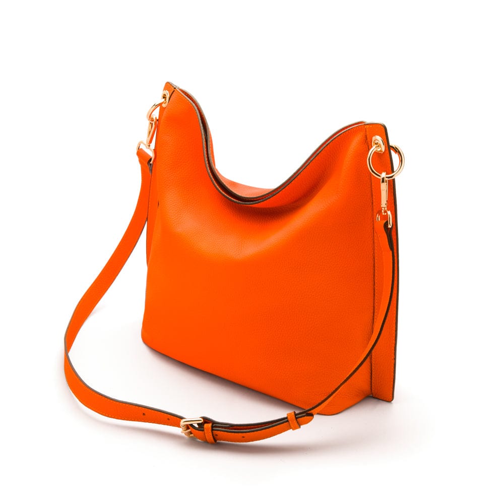 Carol Ann slouchy leather shoulder bag, orange, with detachable shoulder strap