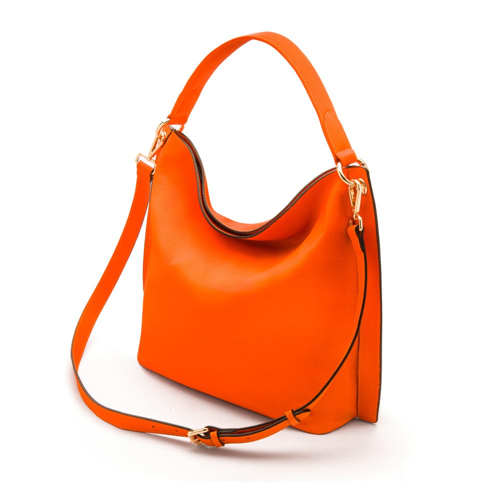 Carol Ann slouchy leather shoulder bag, orange, with both straps
