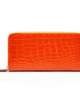 Tall leather zip around accordion purse, orange croc, back