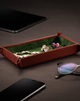 Rectangular leather valet tray, dark tan with green, lifestyle