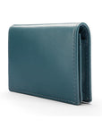 Expandable leather business card holder with stud, petrol blue, side