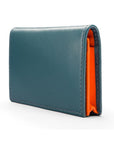 Expandable leather business card holder, petrol blue with orange, side