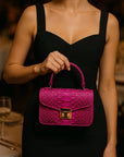 Small real python top handle bag, pink, lifestyle