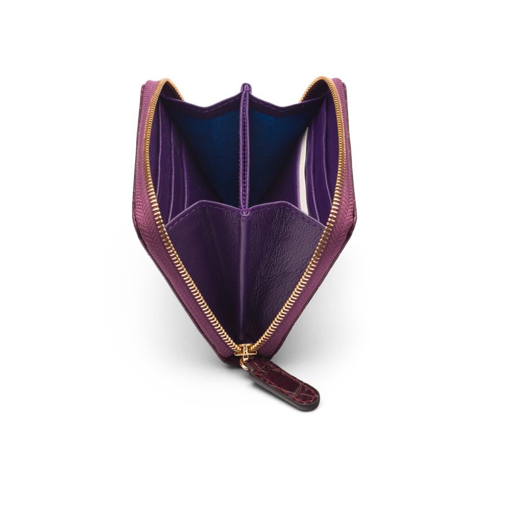 Small leather zip around accordion coin purse, dark purple croc, inside