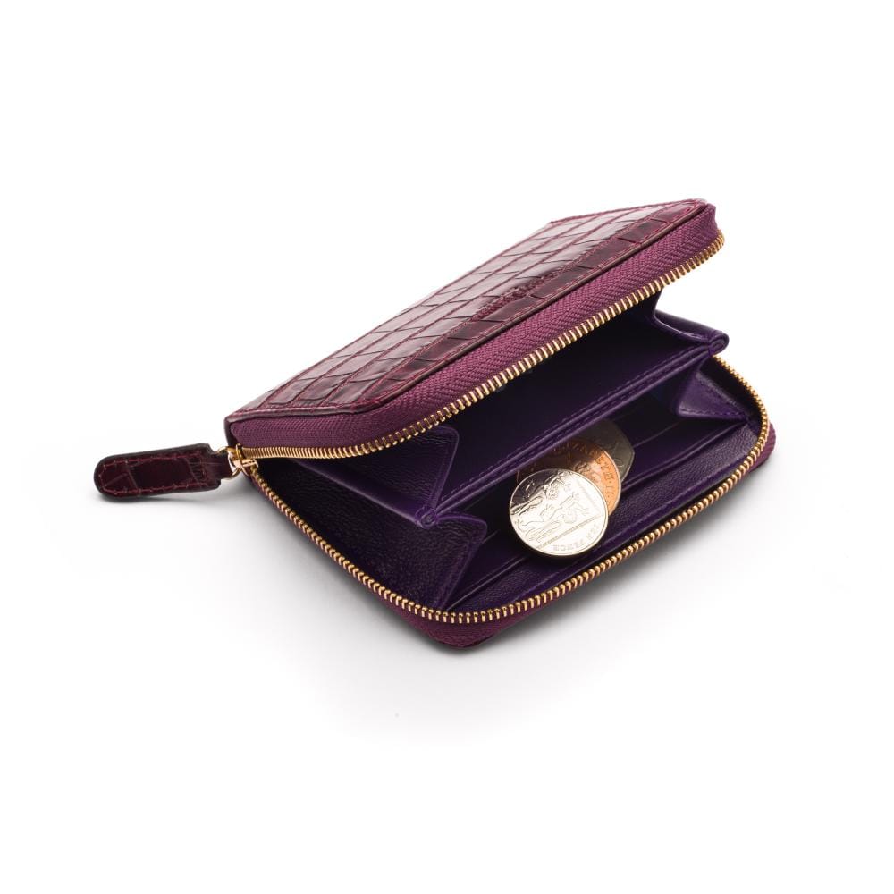 Small leather zip around accordion coin purse, dark purple croc, interior