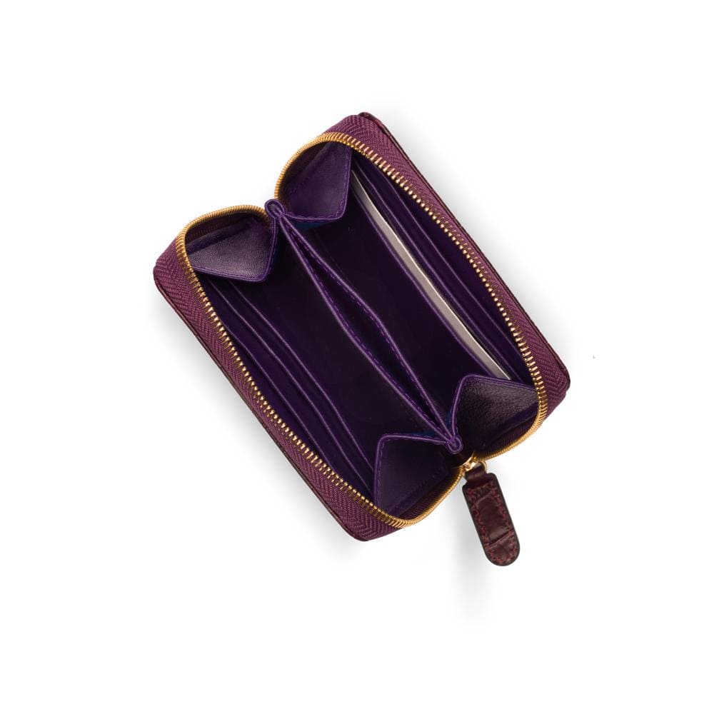 Small leather zip around accordion coin purse, dark purple croc, open