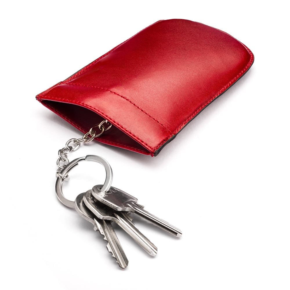 Leather key case with squeeze spring opening, red, open