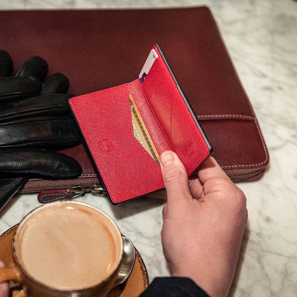 RFID bifold credit card holder, red saffiano, lifestyle