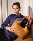 Woven leather shoulder bag, tan, lifestyle