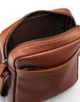 Leather messenger bag with zip, tan, open from the back view