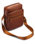 Leather messenger bag with zip, tan, side view