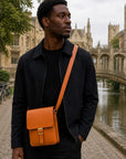 Small leather messenger bag, tan, lifestyle