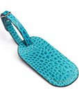Leather luggage tag, turquoise croc, front