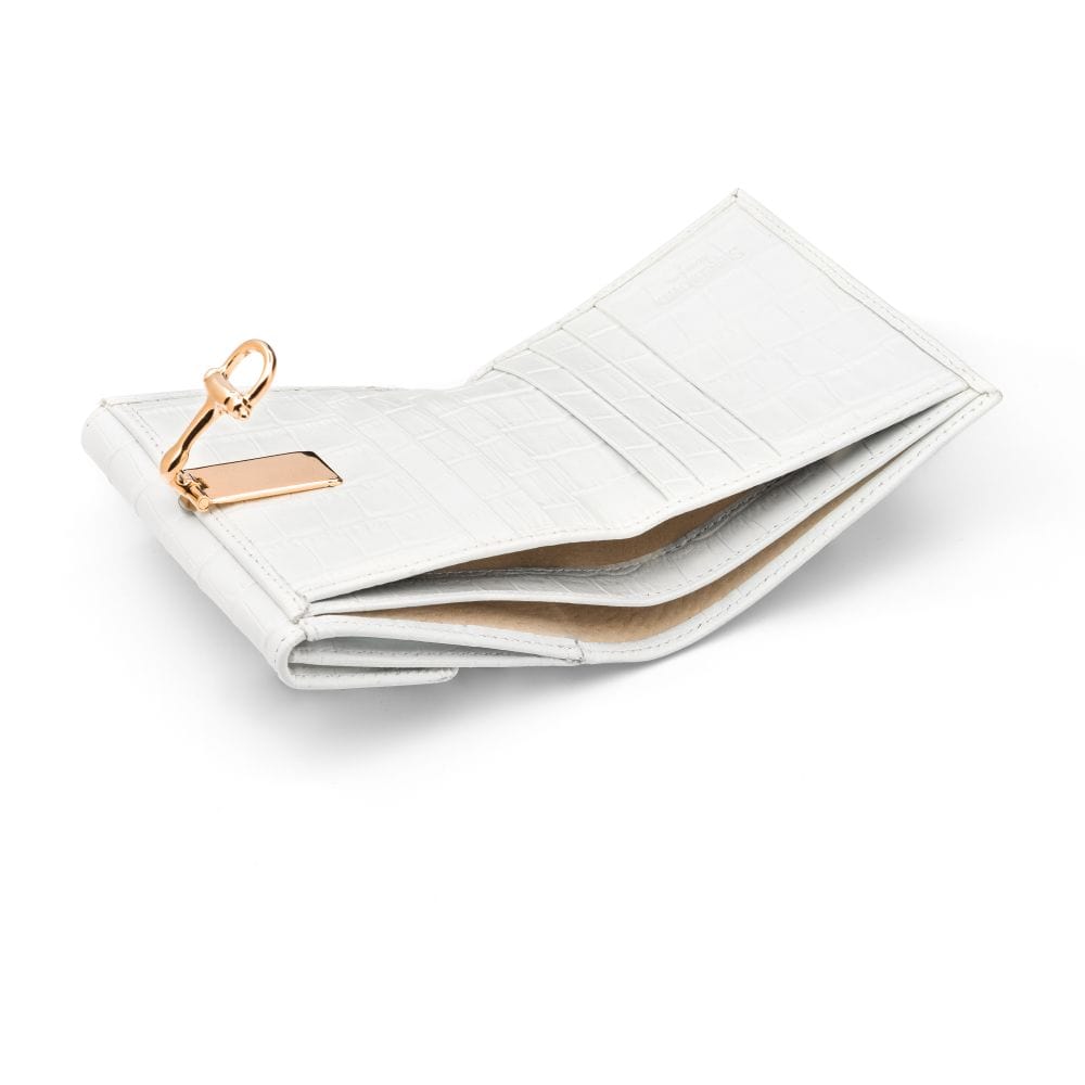 Leather purse with brass clasp, white croc, inside