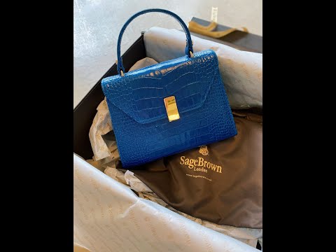 Leather top handle bag, cobalt croc, unwrapping