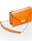 Small leather envelope chain bag, orange, side view