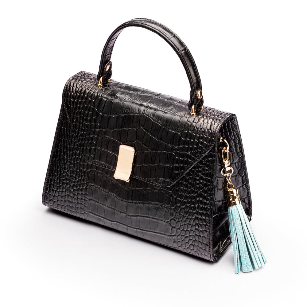 Decorative leather tassel, baby blue, on a bag
