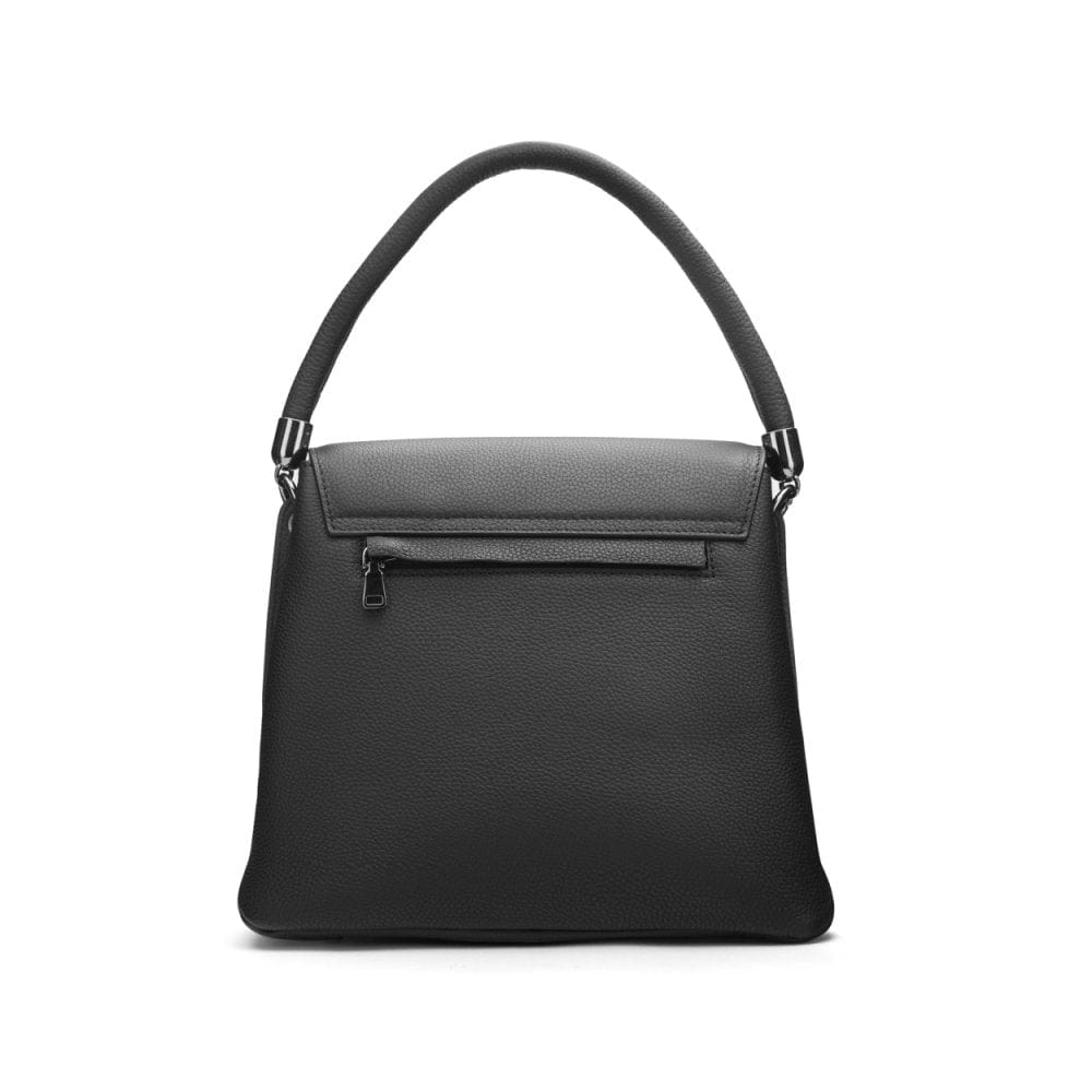 Leather handbag with flap over lid, black, back view