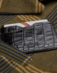 Flat leather credit card case with ID window, black croc, lifestyle